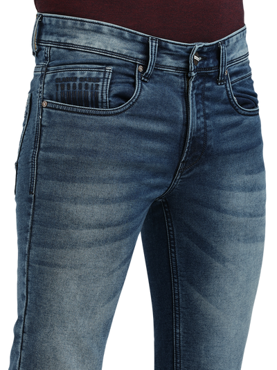 Model wearing Clarke Gable's Blue Whiskers Fade Skinny Fit Jeans in a casual setting