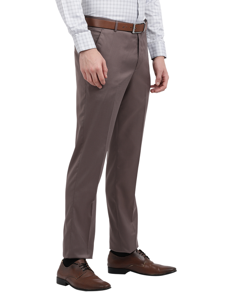 Model wearing Clarke Gable's Brown Casual Fit Trousers in a casual setting