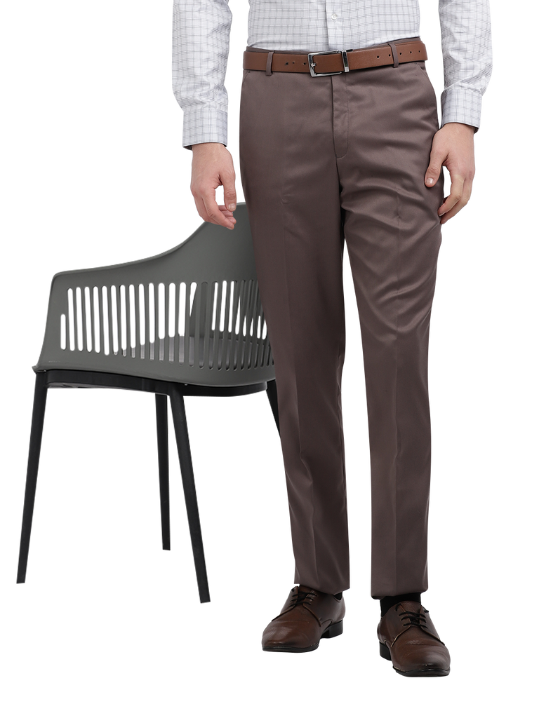 Model wearing Clarke Gable's Brown Casual Fit Trousers in a casual setting