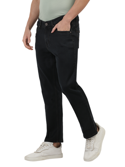 Model wearing Clarke Gable's Brown Tinted Smart Fit Jeans in a casual setting