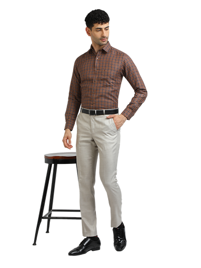Model wearing Clarke Gable's Brown With Navy Checked Formal Shirt in a casual setting