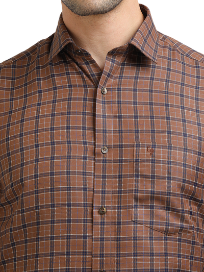 Model wearing Clarke Gable's Brown With Navy Checked Formal Shirt in a casual setting