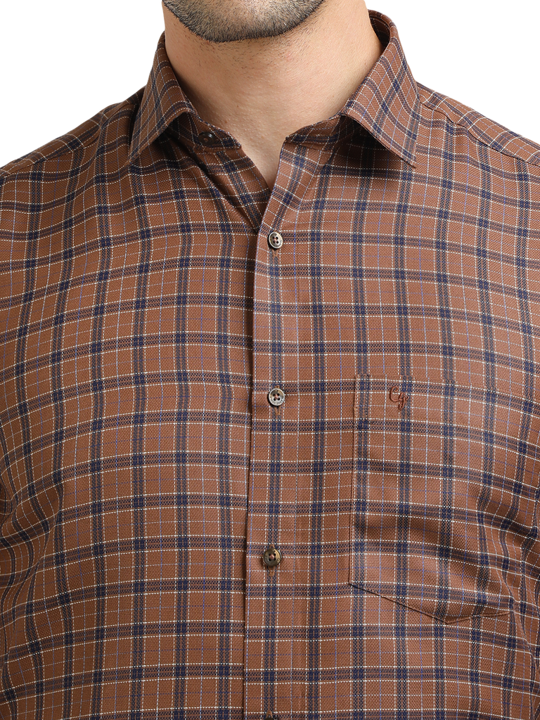 Model wearing Clarke Gable's Brown With Navy Checked Formal Shirt in a casual setting