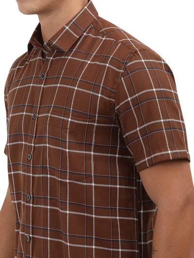 Model wearing Clarke Gable's Brown With White Checked Semi Casual Shirt in a casual setting