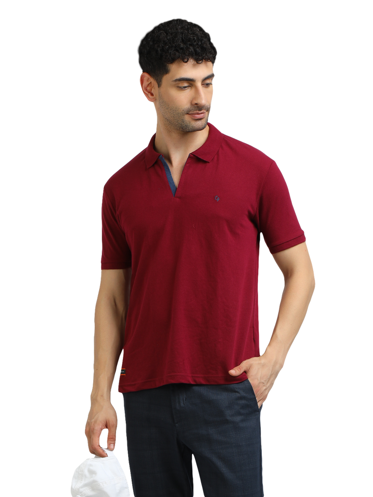 Model wearing Clarke Gable's Burgundy Solid Polo Collar T-Shirt in a casual setting