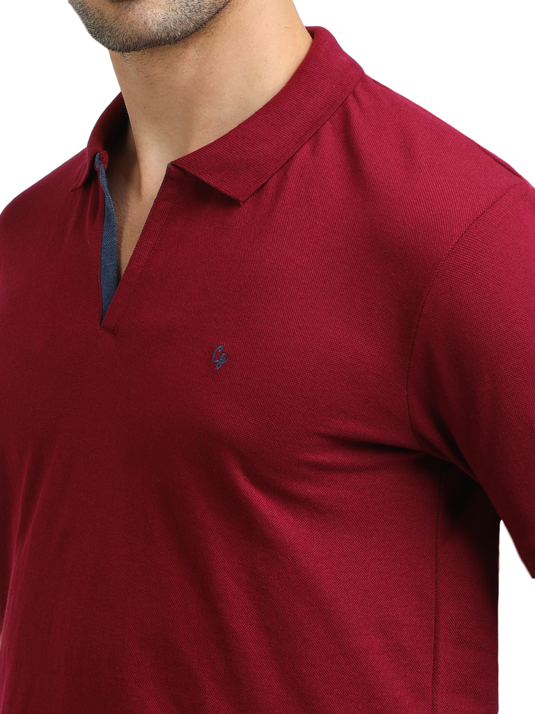 Model wearing Clarke Gable's Burgundy Solid Polo Collar T-Shirt in a casual setting