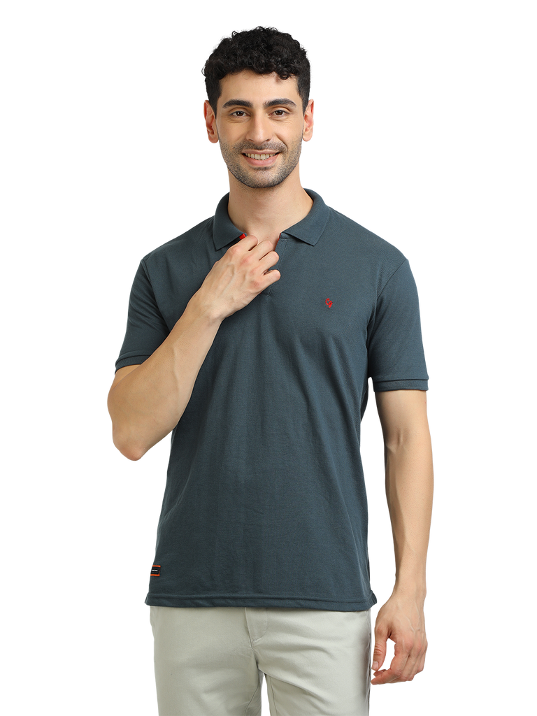 Model wearing Clarke Gable's Charcoal Solid Polo Collar T-Shirt in a casual setting