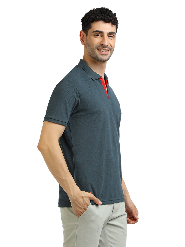 Model wearing Clarke Gable's Charcoal Solid Polo Collar T-Shirt in a casual setting