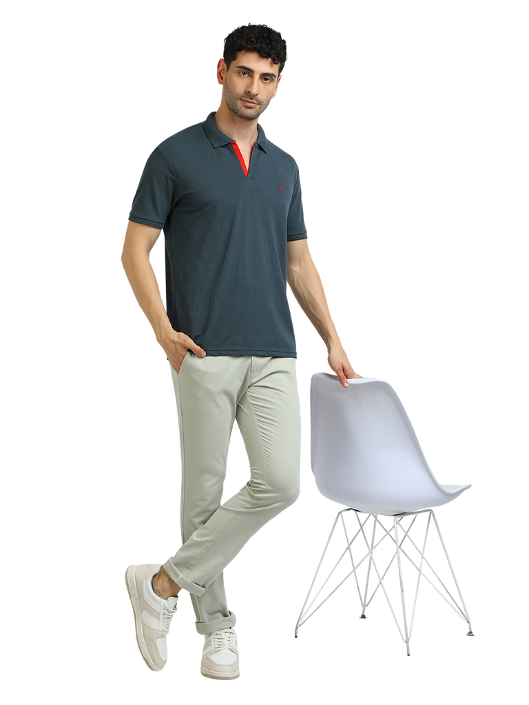 Model wearing Clarke Gable's Charcoal Solid Polo Collar T-Shirt in a casual setting