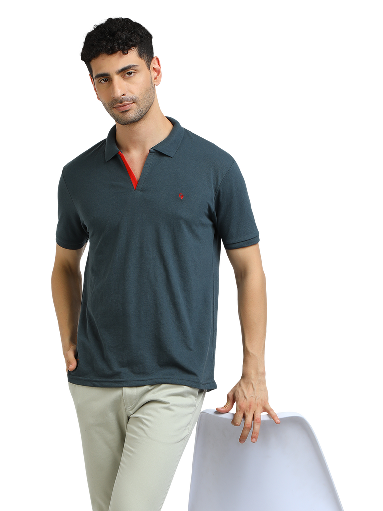 Model wearing Clarke Gable's Charcoal Solid Polo Collar T-Shirt in a casual setting