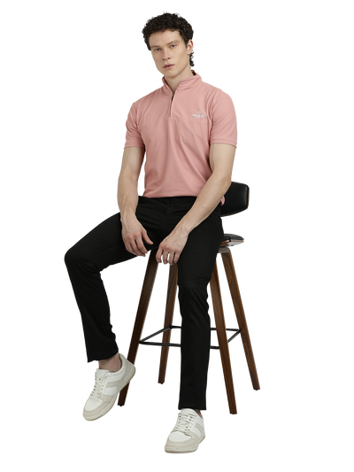 Model wearing Clarke Gable's Black Trim Fit Trousers in a casual setting