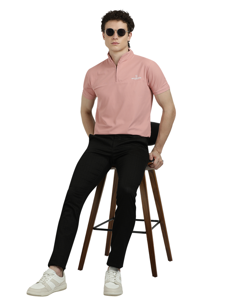 Model wearing Clarke Gable's Black Trim Fit Trousers in a casual setting