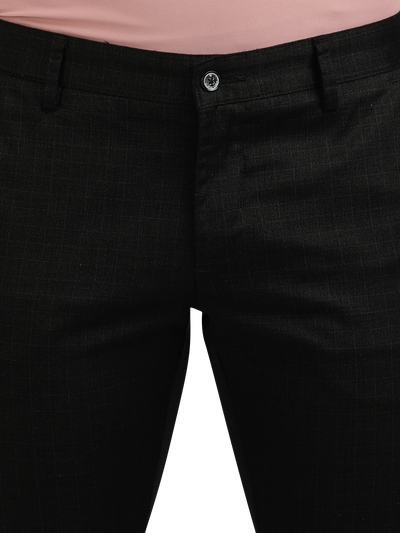 Model wearing Clarke Gable's Black Trim Fit Trousers in a casual setting