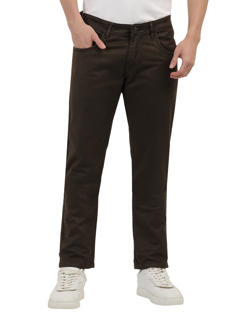 Model wearing Clarke Gable's Coolmax Coffee Skinny Fit Jeans in a casual setting