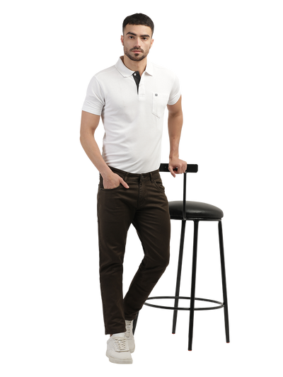Model wearing Clarke Gable's Coolmax Coffee Skinny Fit Jeans in a casual setting