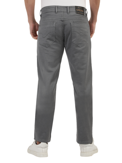 Model wearing Clarke Gable's Coolmax Grey Skinny Fit Jeans in a casual setting