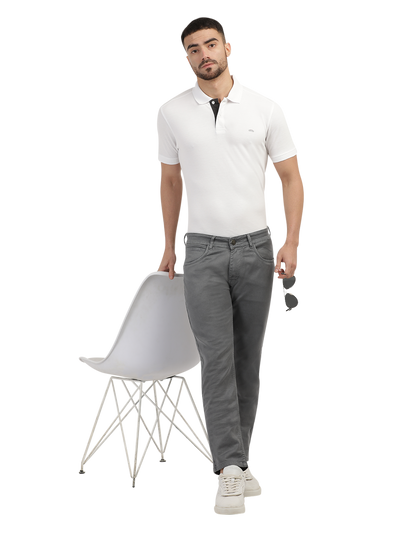 Model wearing Clarke Gable's Coolmax Grey Skinny Fit Jeans in a casual setting