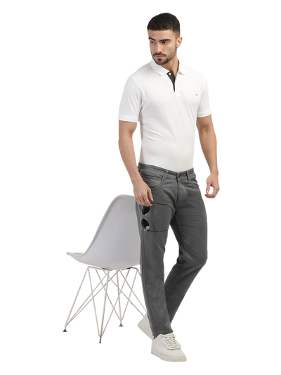 Model wearing Clarke Gable's Coolmax Grey Skinny Fit Jeans in a casual setting