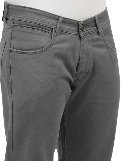 Model wearing Clarke Gable's Coolmax Grey Skinny Fit Jeans in a casual setting