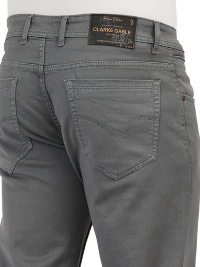 Model wearing Clarke Gable's Coolmax Grey Skinny Fit Jeans in a casual setting