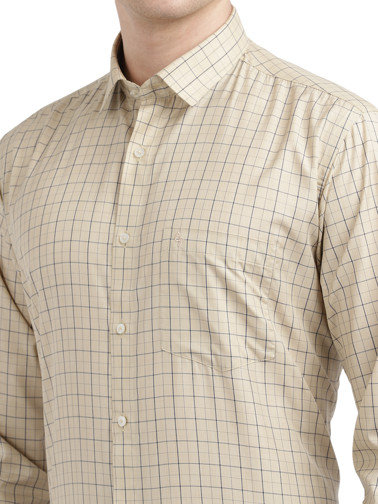 Model wearing Clarke Gable's Cream Checked Formal Shirt in a casual setting