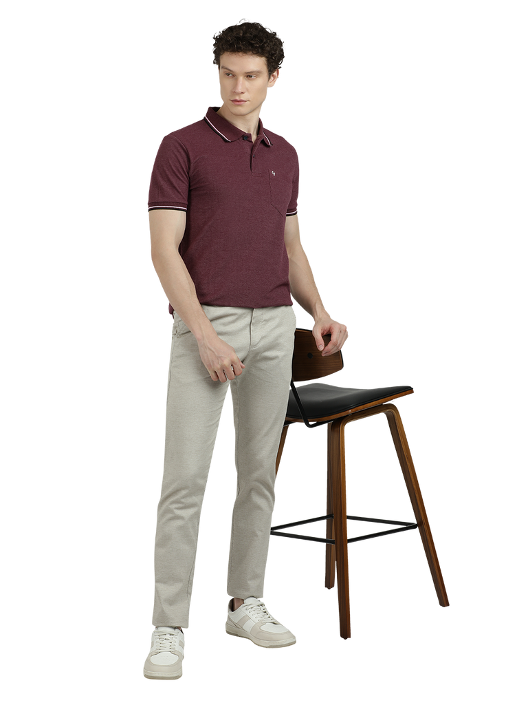 Model wearing Clarke Gable's Cream Custom Fit Trousers in a casual setting