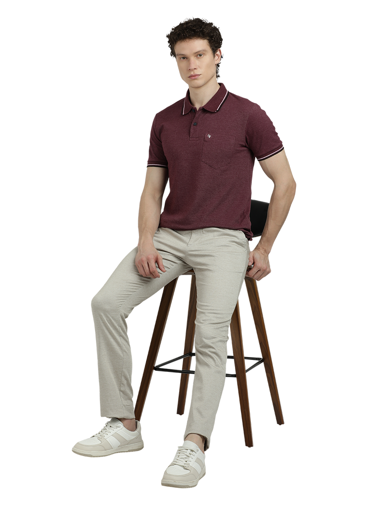 Model wearing Clarke Gable's Cream Custom Fit Trousers in a casual setting