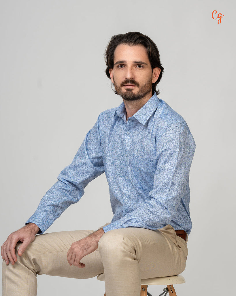 Model wearing Clarke Gable's Sky Blue Printed Formal Shirt in a casual setting