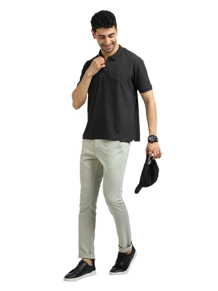 Model wearing Clarke Gable's Dark Anthra Solid Polo Collar T-Shirt in a casual setting