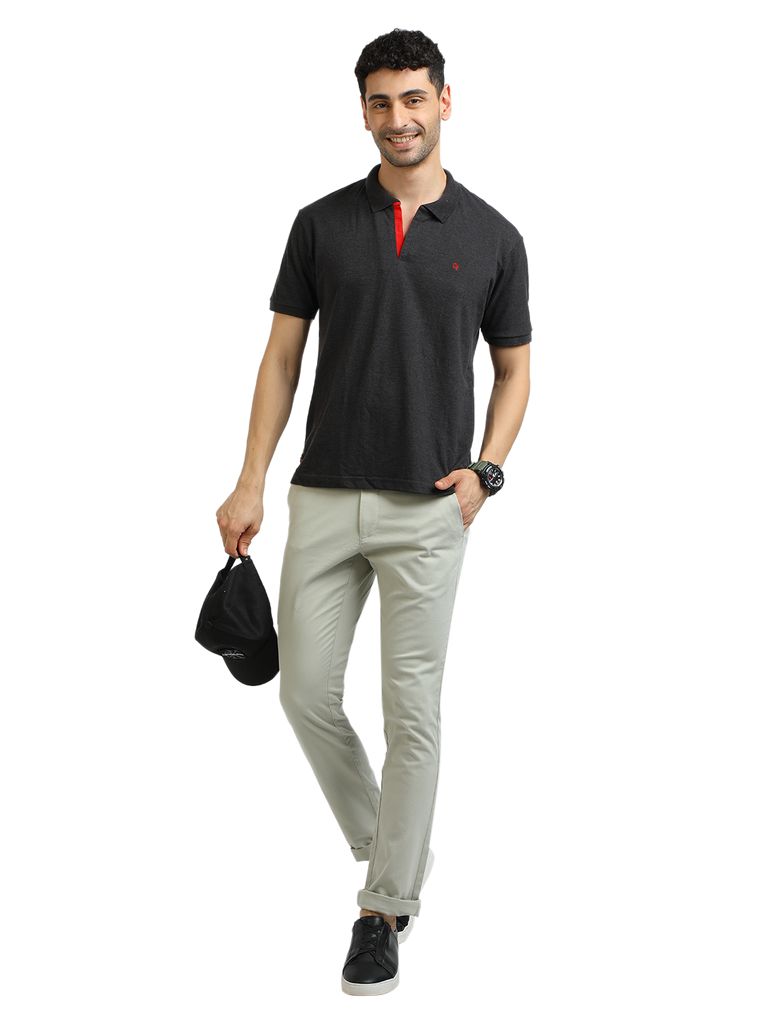 Model wearing Clarke Gable's Dark Anthra Solid Polo Collar T-Shirt in a casual setting