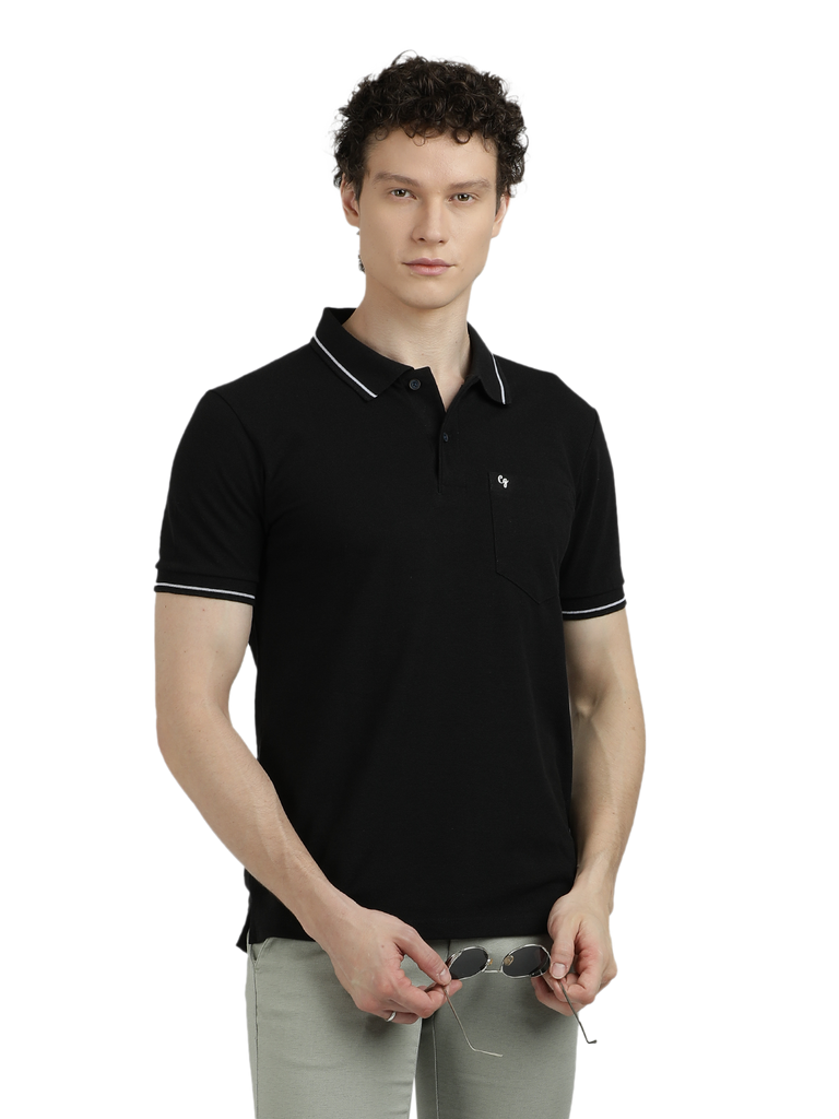 Model wearing Clarke Gable's Dark Black Solid Polo Collar T-Shirt in a casual setting