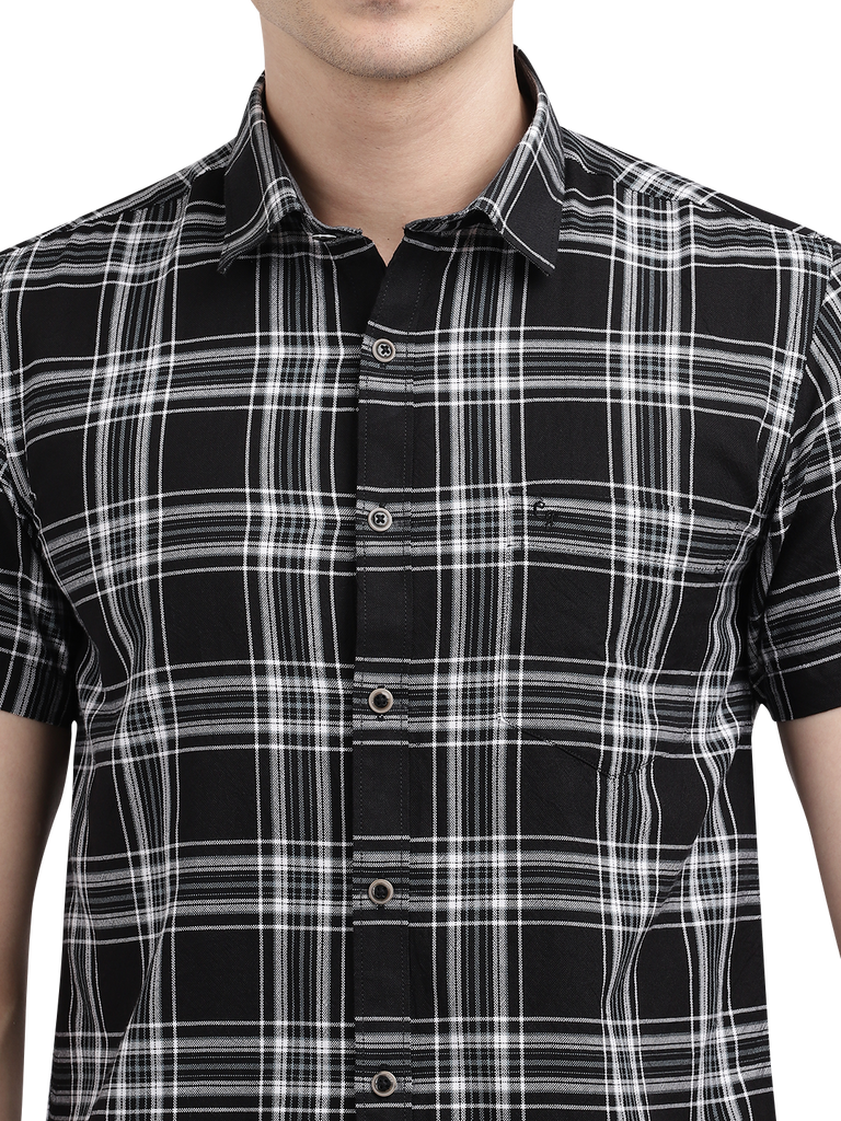 Model wearing Clarke Gable's Dark Black With White Checked Casual Shirt in a casual setting