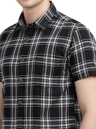 Model wearing Clarke Gable's Dark Black With White Checked Casual Shirt in a casual setting