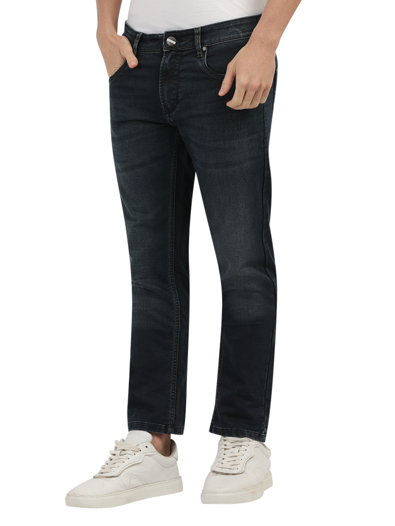 Model wearing Clarke Gable's Dark Blue Tinted Skinny Fit Jeans in a casual setting