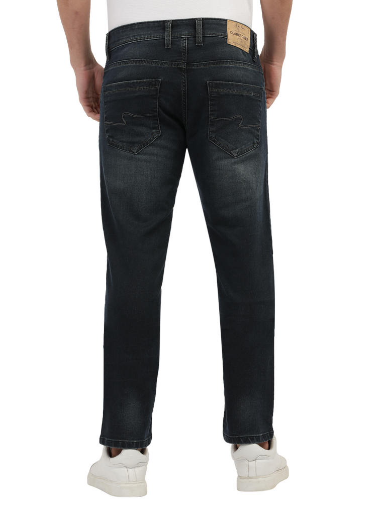 Model wearing Clarke Gable's Dark Blue Tinted Skinny Fit Jeans in a casual setting