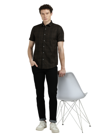 Model wearing Clarke Gable's Dark Brown Checked Semi Casual Shirt in a casual setting