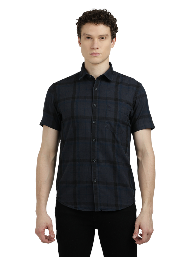 Model wearing Clarke Gable's Dark Grey Checked Semi Casual Shirt in a casual setting