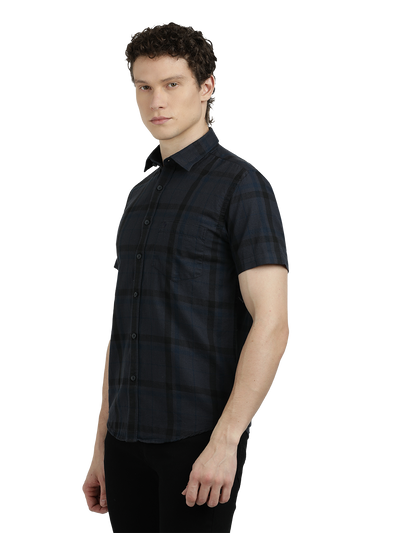 Model wearing Clarke Gable's Dark Grey Checked Semi Casual Shirt in a casual setting