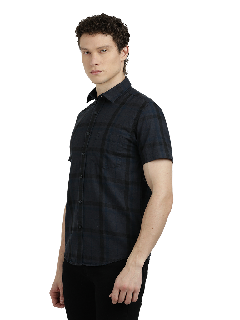 Model wearing Clarke Gable's Dark Grey Checked Semi Casual Shirt in a casual setting