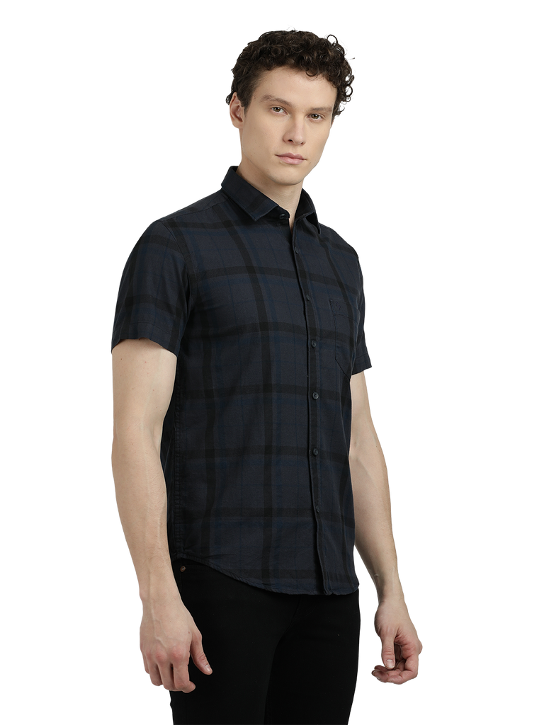 Model wearing Clarke Gable's Dark Grey Checked Semi Casual Shirt in a casual setting