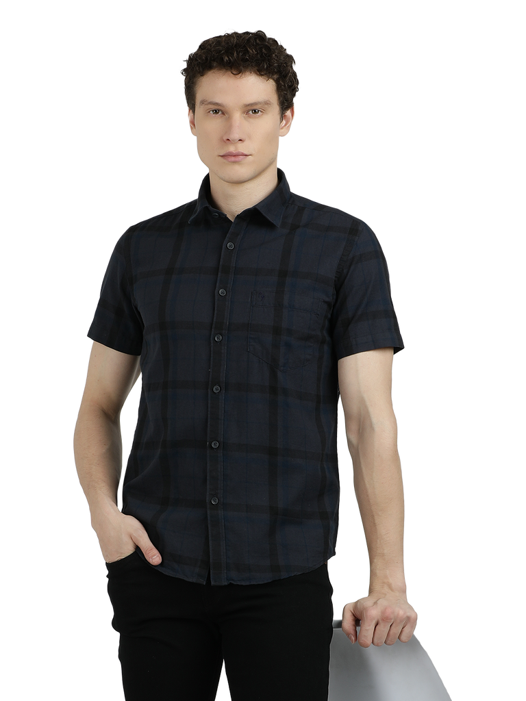 Model wearing Clarke Gable's Dark Grey Checked Semi Casual Shirt in a casual setting