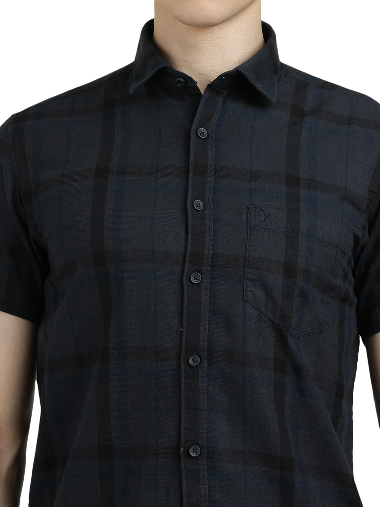 Model wearing Clarke Gable's Dark Grey Checked Semi Casual Shirt in a casual setting