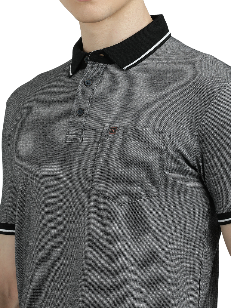 Model wearing Clarke Gable's Dark Grey Solid Polo Collar T-Shirt in a casual setting