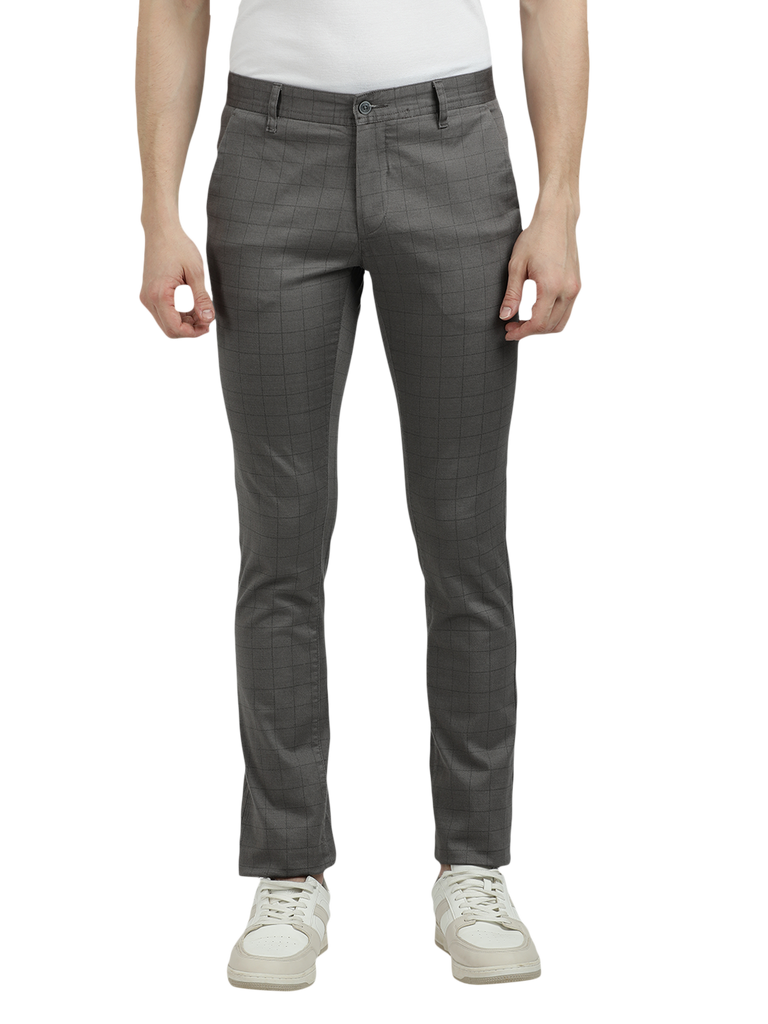 Model wearing Clarke Gable's Dark Grey Trim Fit Trousers in a casual setting