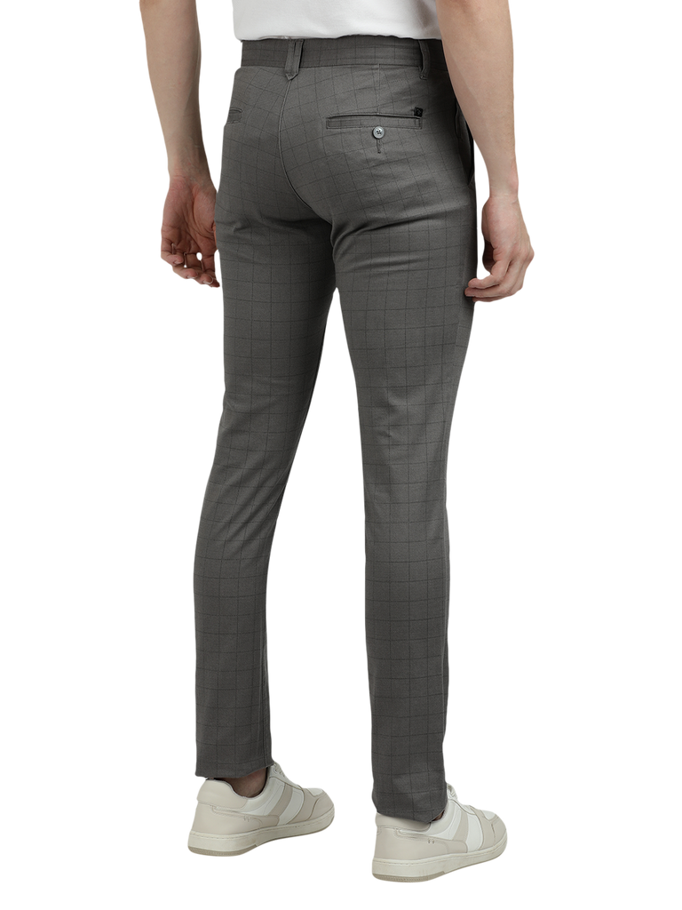 Model wearing Clarke Gable's Dark Grey Trim Fit Trousers in a casual setting