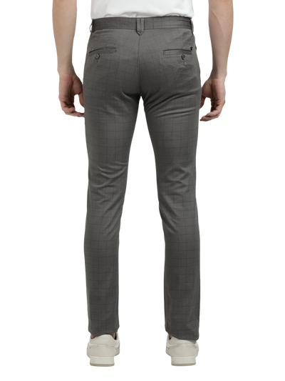 Model wearing Clarke Gable's Dark Grey Trim Fit Trousers in a casual setting