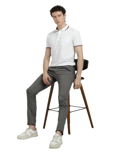 Model wearing Clarke Gable's Dark Grey Trim Fit Trousers in a casual setting