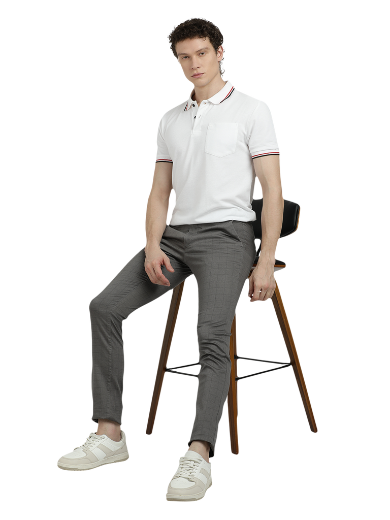 Model wearing Clarke Gable's Dark Grey Trim Fit Trousers in a casual setting