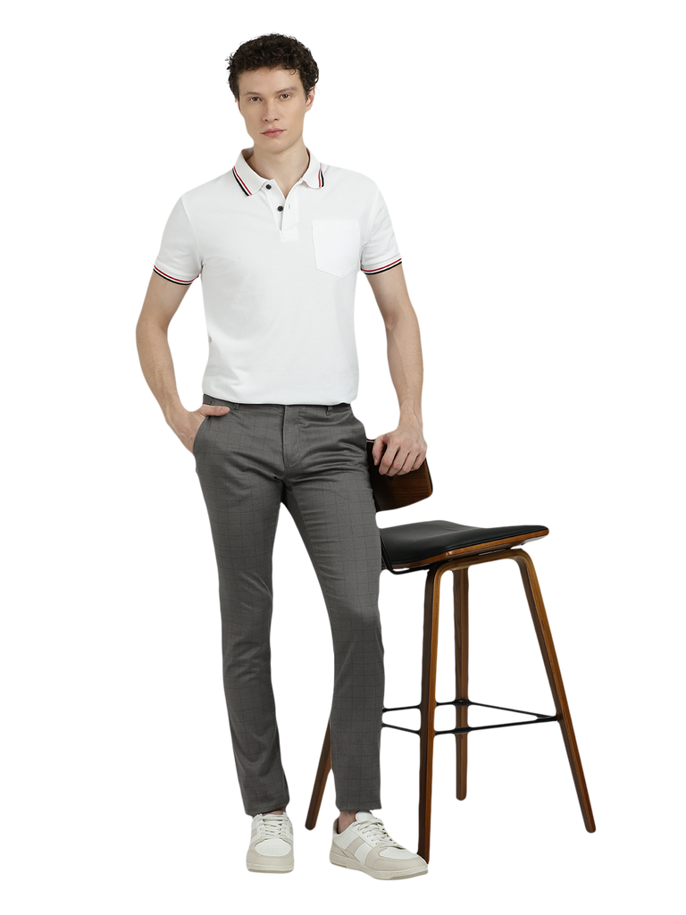 Model wearing Clarke Gable's Dark Grey Trim Fit Trousers in a casual setting