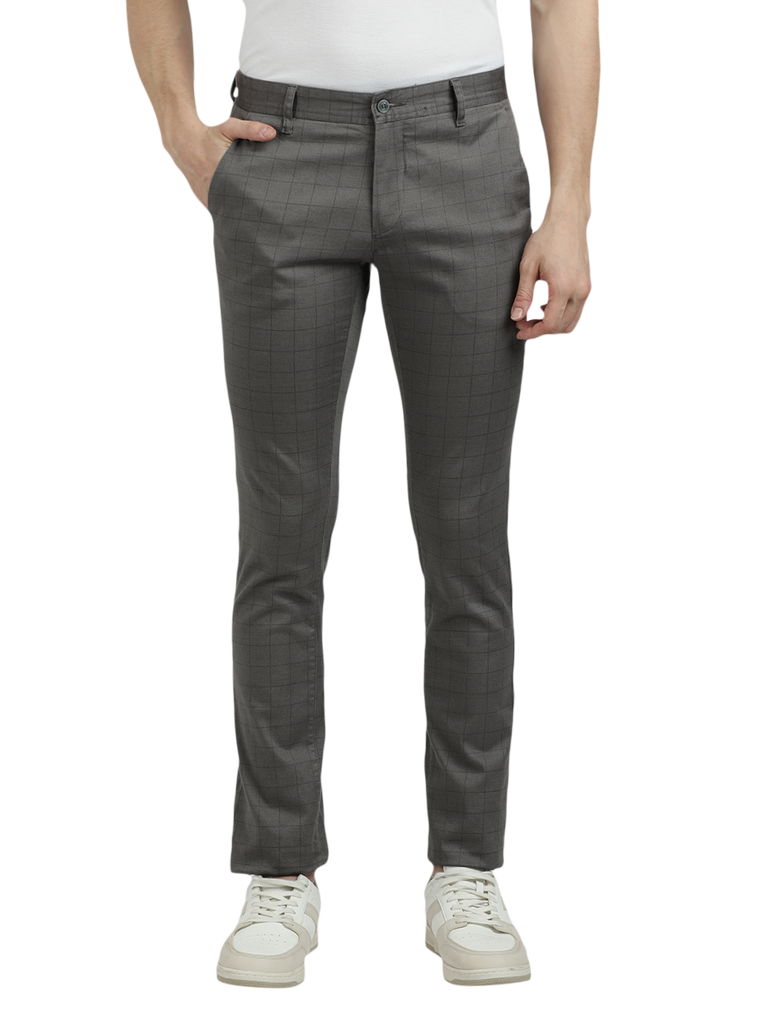 Model wearing Clarke Gable's Dark Grey Trim Fit Trousers in a casual setting